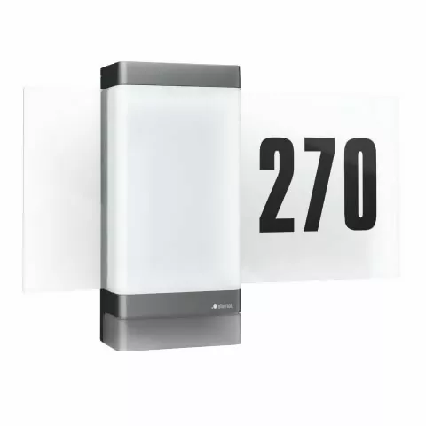 Die Steinel L 270 Digi SC ist eine smarte LED-Hausnummernleuchte mit integriertem Bewegungssensor. Sie kombiniert modernes Design mit intelligenter Technologie und sorgt für eine effiziente Beleuchtung von Eingangsbereichen. Die Leuchte verfügt über eine d